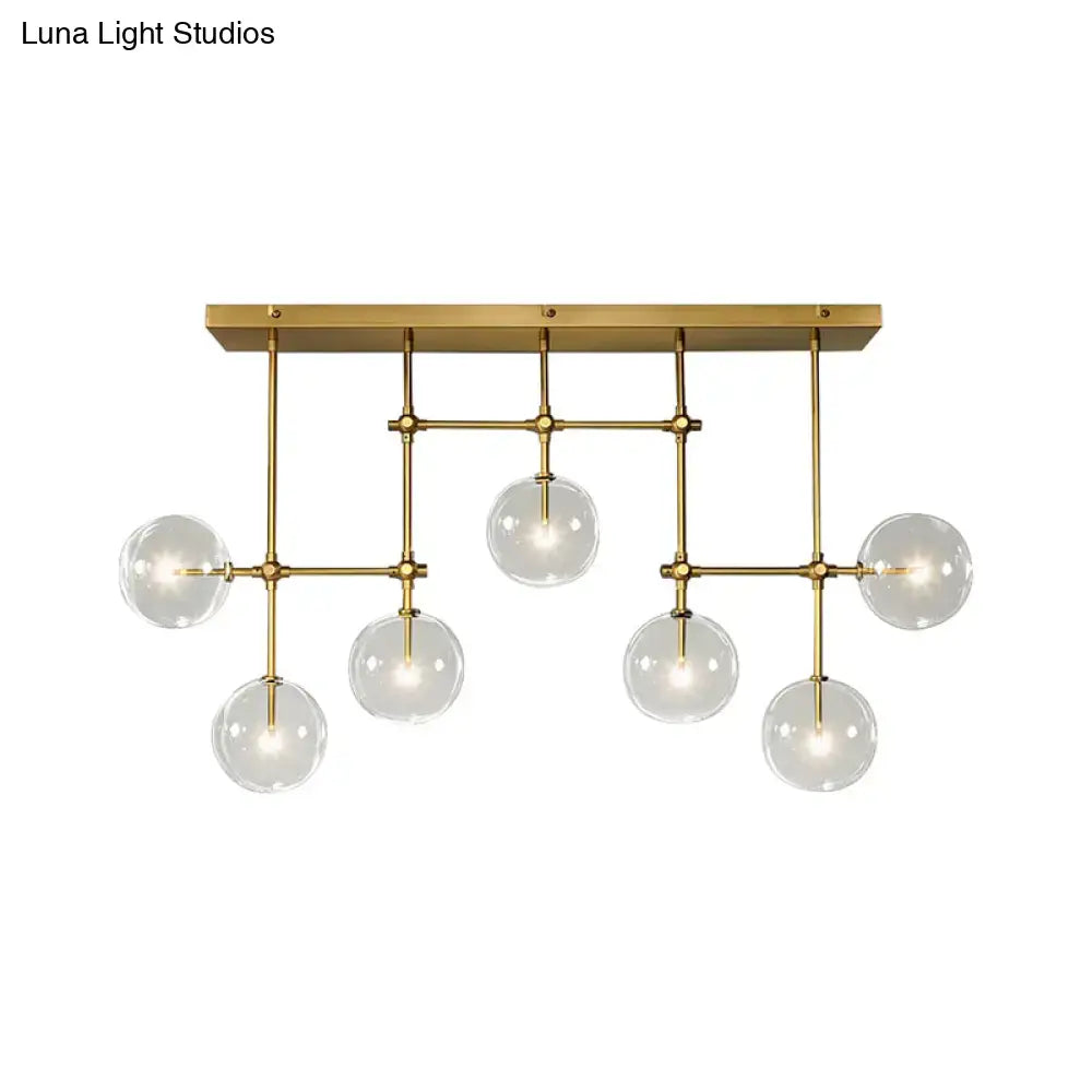 Black Gold Sphere Light chandelier by Decorbites; brass frame with clear glass globes on Tampa Home & Garden Store