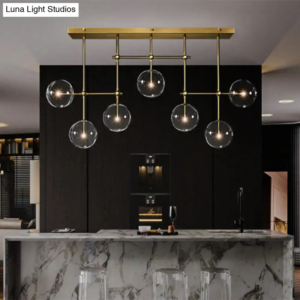 Black Gold Sphere Light chandelier with brass rods and glass globes by Decorbites on Tampa Home & Garden Store