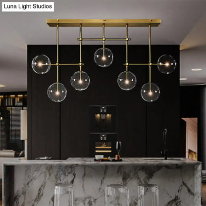 Black Gold Sphere Light chandelier with brass rods and glass globes by Decorbites on Tampa Home & Garden Store