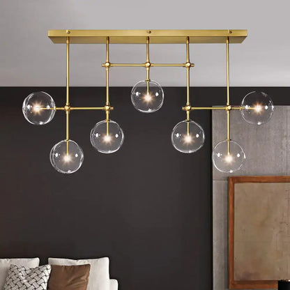 Black Gold Sphere Light by Decorbites; brass finish chandelier with clear glass globes on Tampa Home & Garden Store