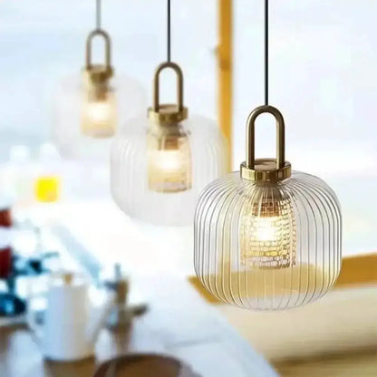 Pendant lights with glass ribbed globes and brass hardware, set of three on Tampa Home & Garden Store