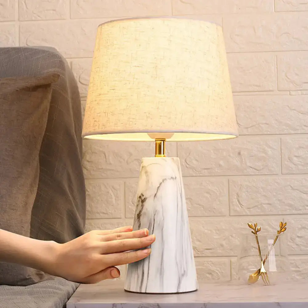 White marble and beige fabric tapered table lamp with gold neck for bedroom decor on Tampa Home & Garden Store