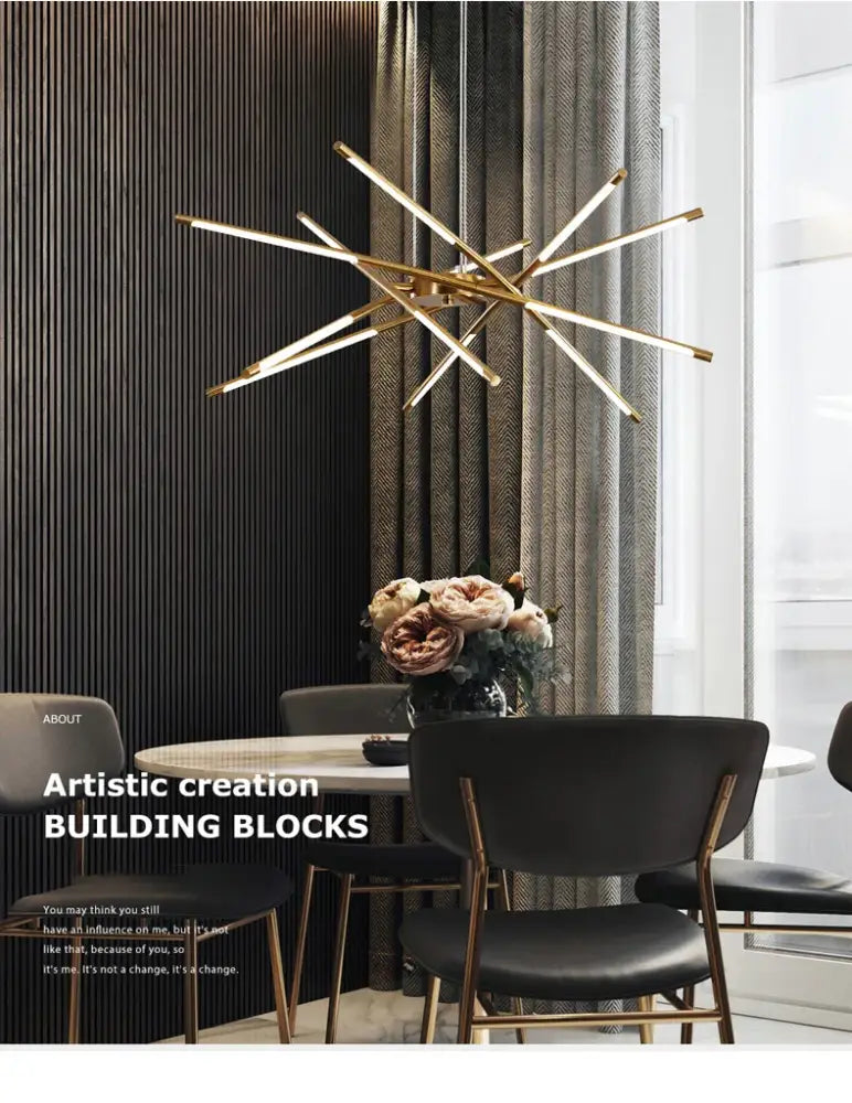 Gold Nordic LED Chandelier by Decorbites over dining chairs with brass legs on Tampa Home & Garden Store