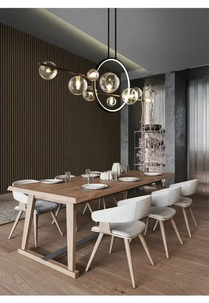Chandelier: Decorbites modern black Nordic glass bubble LED ring over a wooden dining table on Tampa Home & Garden Store