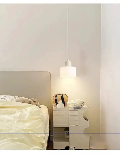 Orange olive glass chandelier pendant lights by Decorbites in bedroom over nightstand on Tampa Home & Garden Store