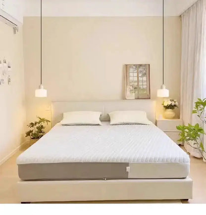Pendant lights from Decorbites, white glass, two hanging over bed in a neutral bedroom on Tampa Home & Garden Store