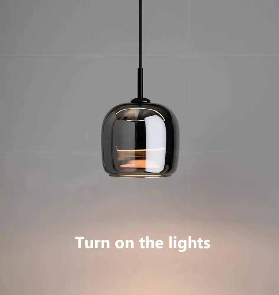 Modern glossy black Nordic glass LED pendant by Decorbites for dining room chandeliers on Tampa Home & Garden Store