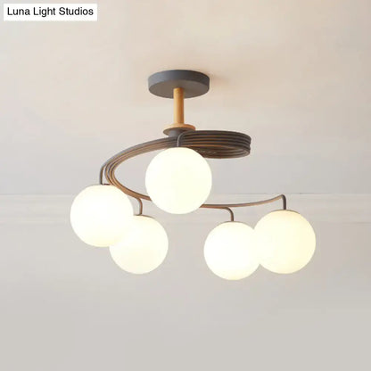 Green Grey Orb Chandelier with white glass globes on curved metal arms on Tampa Home & Garden Store
