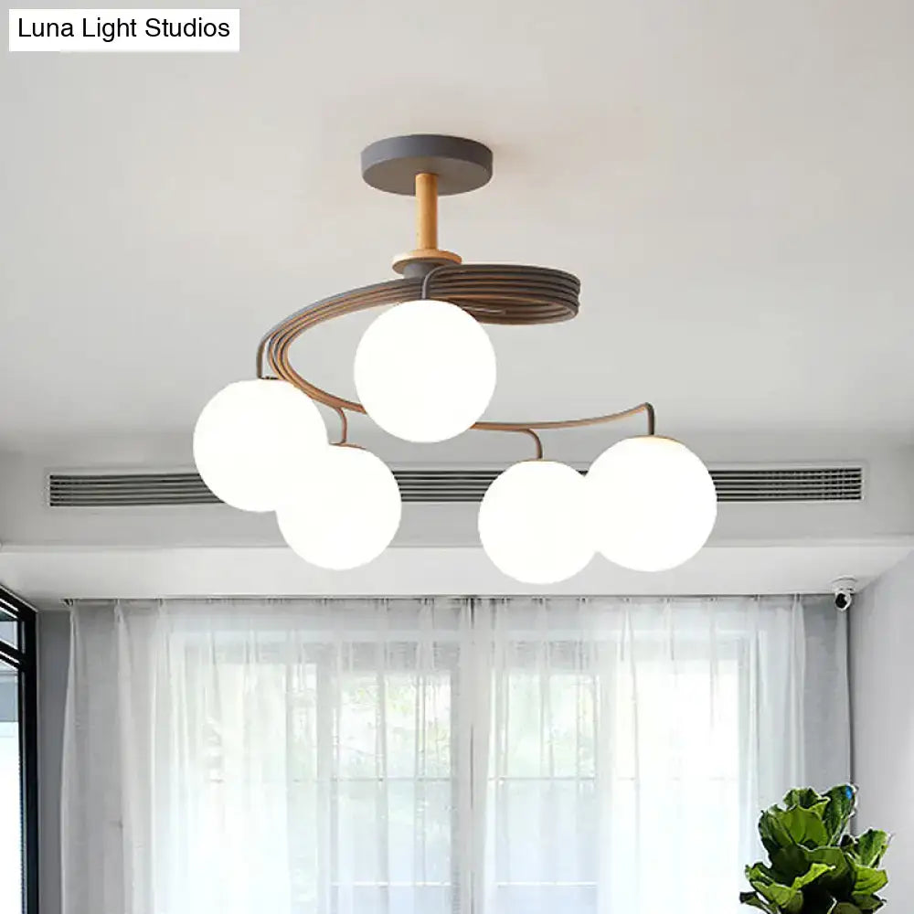 Green Grey Orb Chandelier with copper curved arms and five frosted glass globes Decorbites on Tampa Home & Garden Store