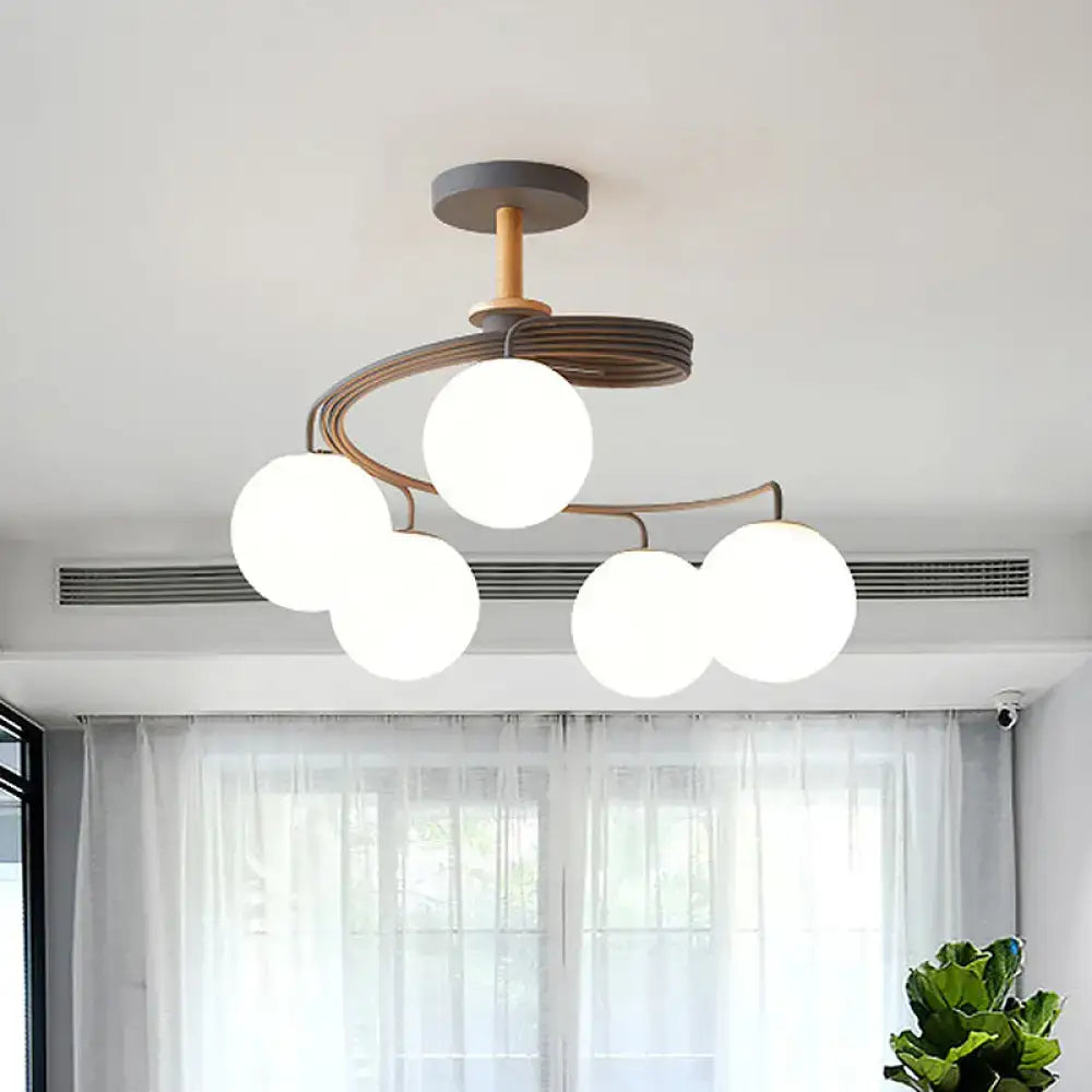 Green Grey Orb Chandelier with five white globes on copper arcs Decorbites on Tampa Home & Garden Store