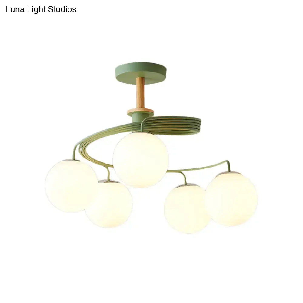 Green Grey Orb Chandelier by Decorbites with frosted glass globes and wood accents on Tampa Home & Garden Store