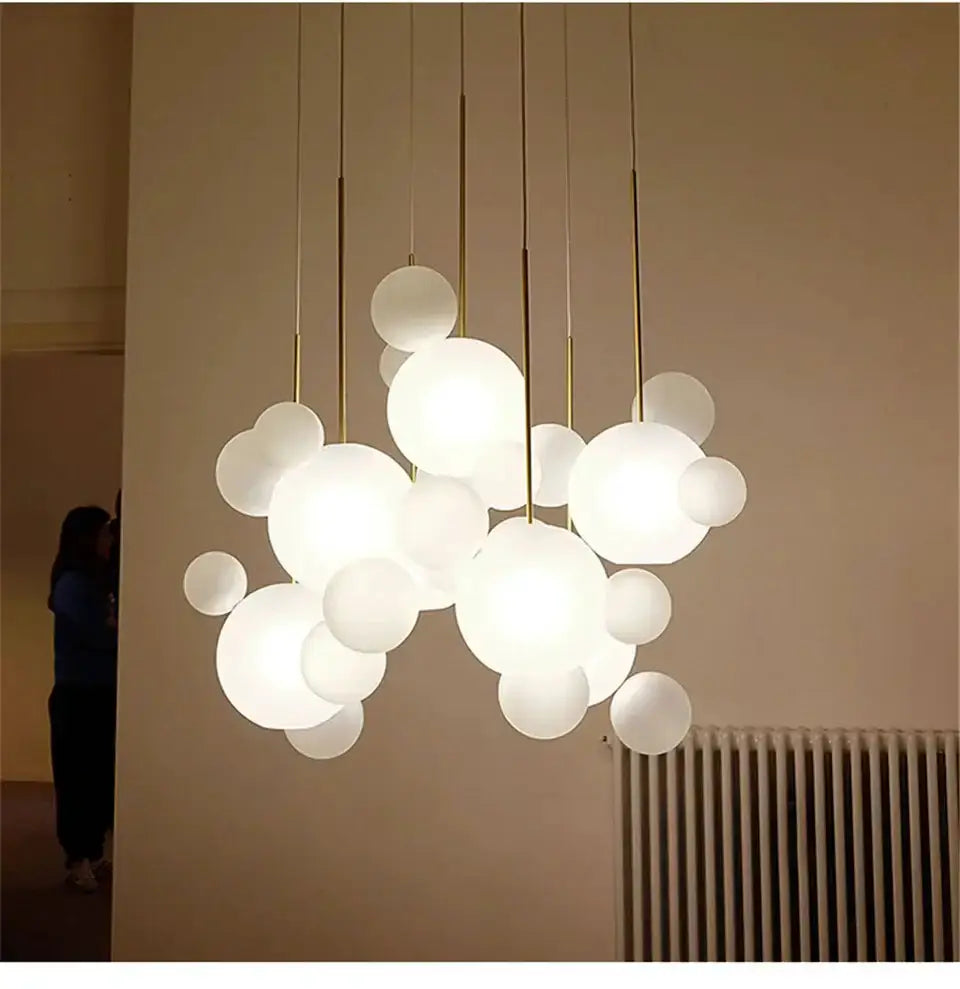 Chandelier with seven frosted glass globes on gold stems, Decorbites modern LED chandelier on Tampa Home & Garden Store