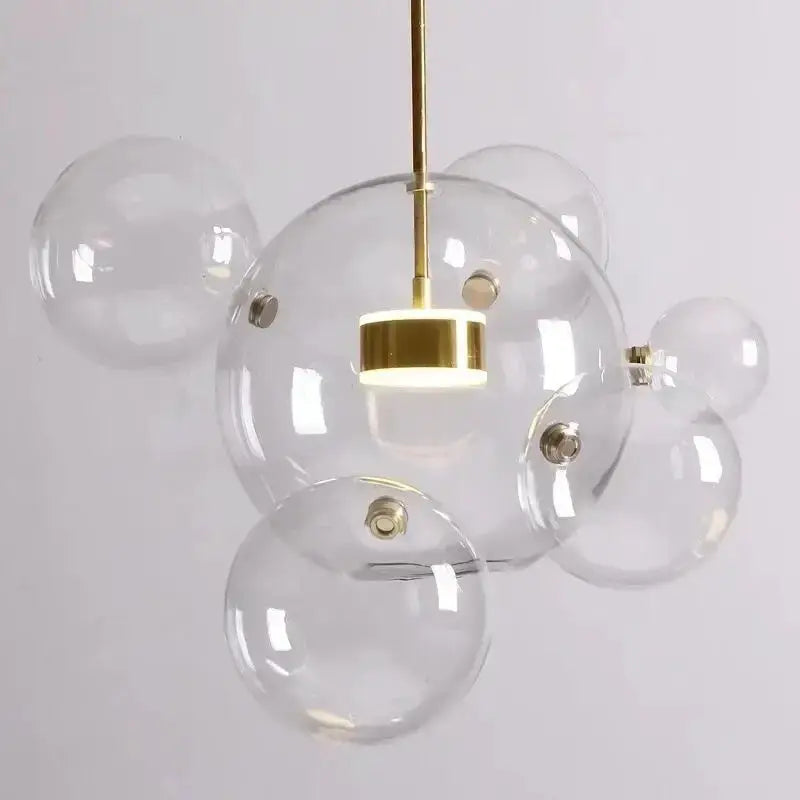 Chandelier Decorbites modern 7-globe clear glass LED with gold-tone accents on Tampa Home & Garden Store