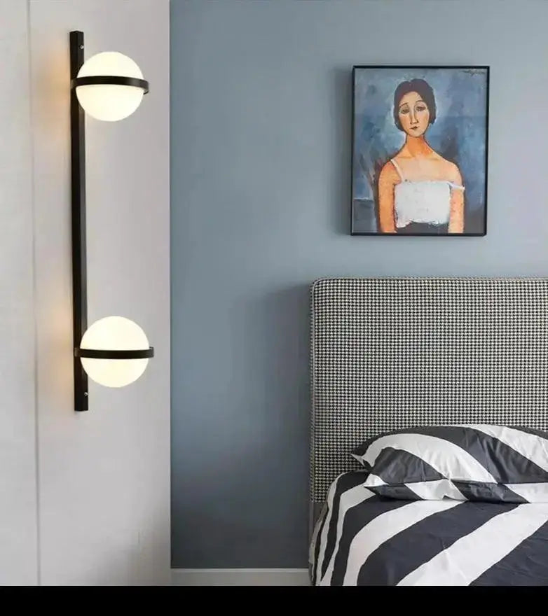 Modern black nordic planter light sconce with dual glass globes by Decorbites in bedroom on Tampa Home & Garden Store