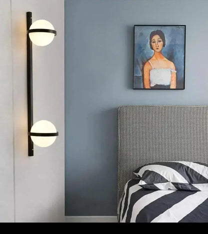 Modern black nordic planter light sconce with dual glass globes by Decorbites in bedroom on Tampa Home & Garden Store