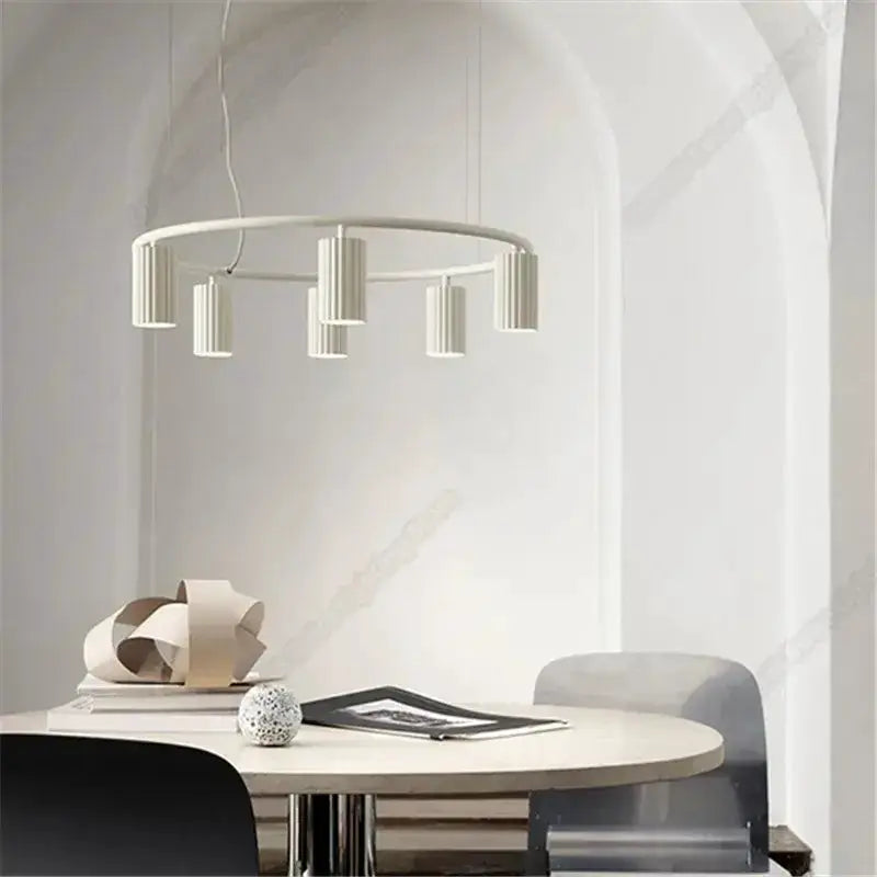 Decorbites donna circle chandelier with natural wood ring and five pendants over dining table on Tampa Home & Garden Store