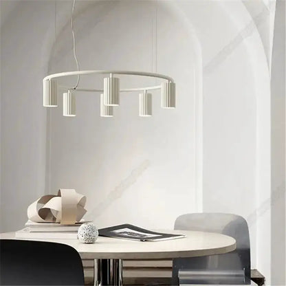 Decorbites donna circle chandelier with natural wood ring and five pendants over dining table on Tampa Home & Garden Store