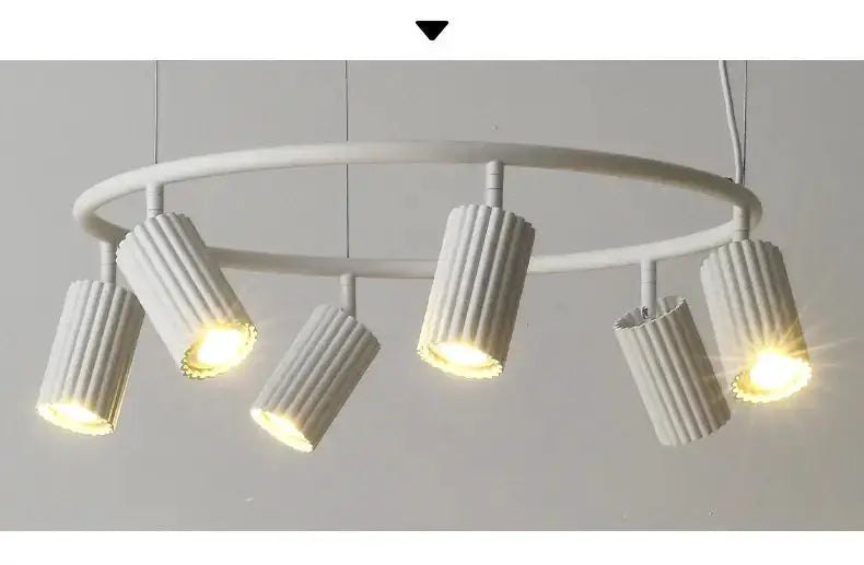 Modern donna circle chandelier with multiple ribbed white cylindrical shades by Decorbites on Tampa Home & Garden Store