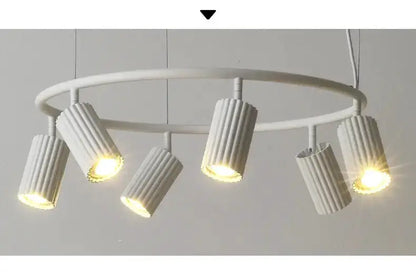 Modern donna circle chandelier with multiple ribbed white cylindrical shades by Decorbites on Tampa Home & Garden Store