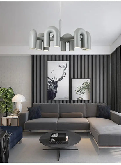 Blue U-Shape Ceiling Light chandelier by Decorbites, modern curved tubes above seating on Tampa Home & Garden Store