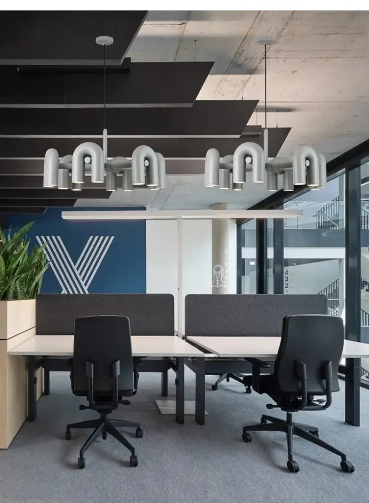 Blue U-Shape Ceiling Light chandeliers by Decorbites in a modern office space with two fixtures on Tampa Home & Garden Store