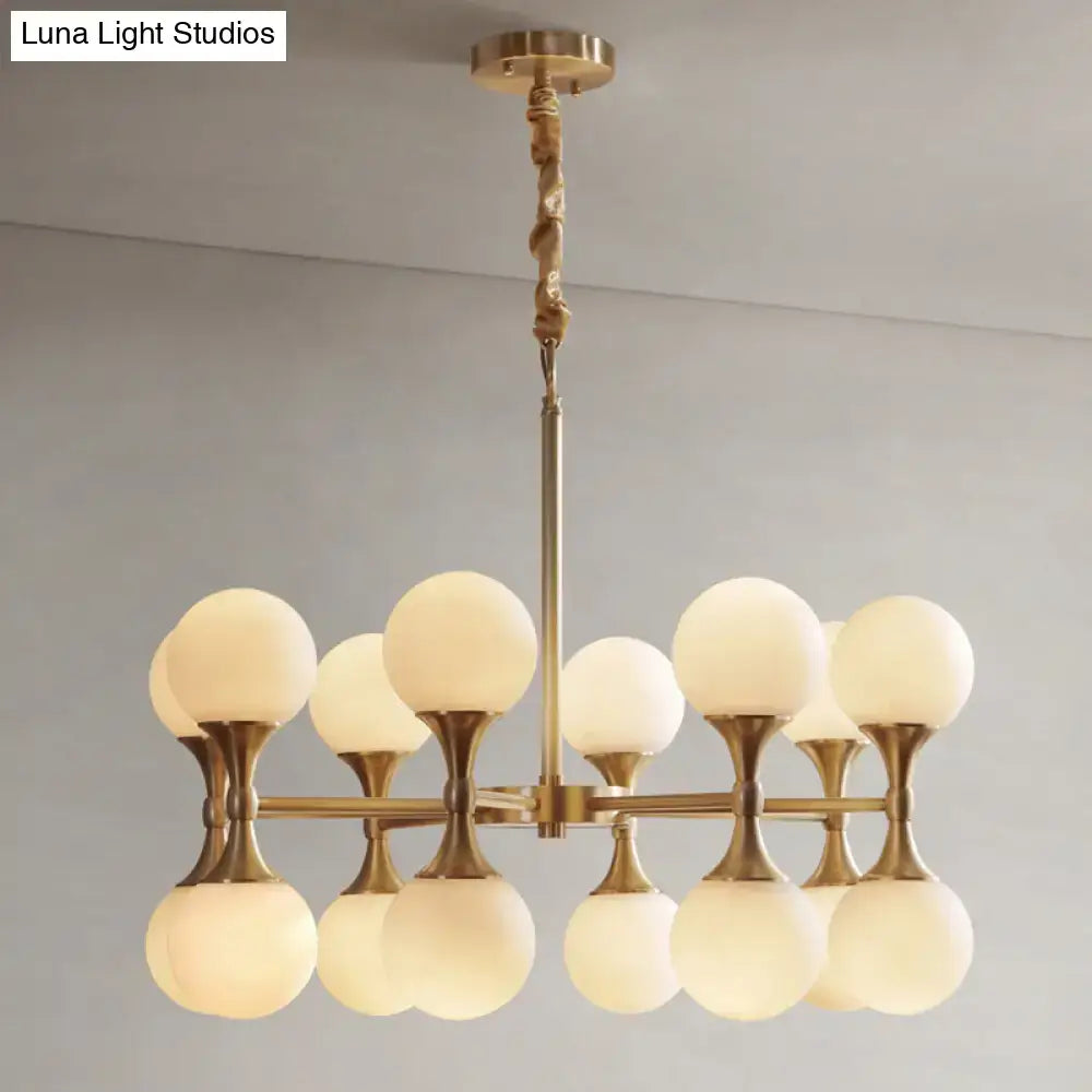Brass globe chandelier with 12 frosted glass spheres, Decorbites ceiling pendant on Tampa Home & Garden Store