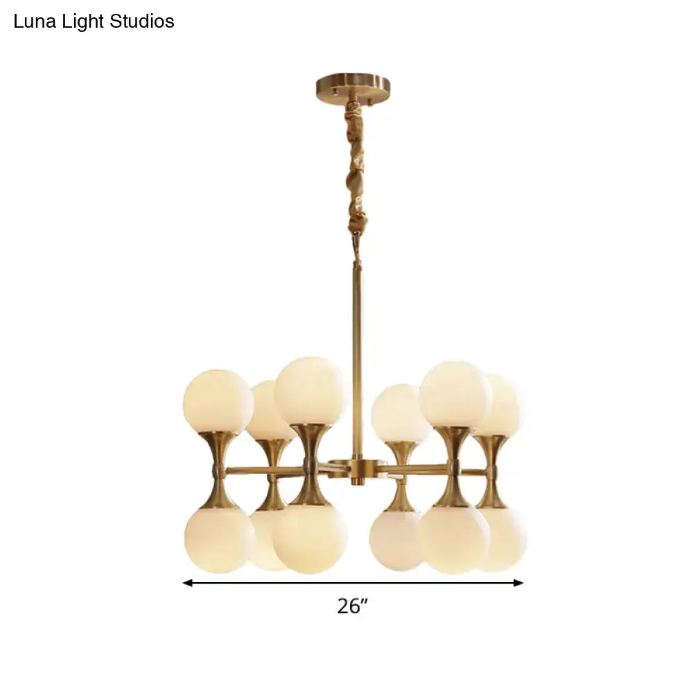 Brass Globe Chandelier by Decorbites, six frosted glass globes on brass frame on Tampa Home & Garden Store