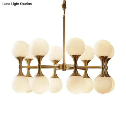 Brass Globe Chandelier by Decorbites with frosted glass globes on Tampa Home & Garden Store