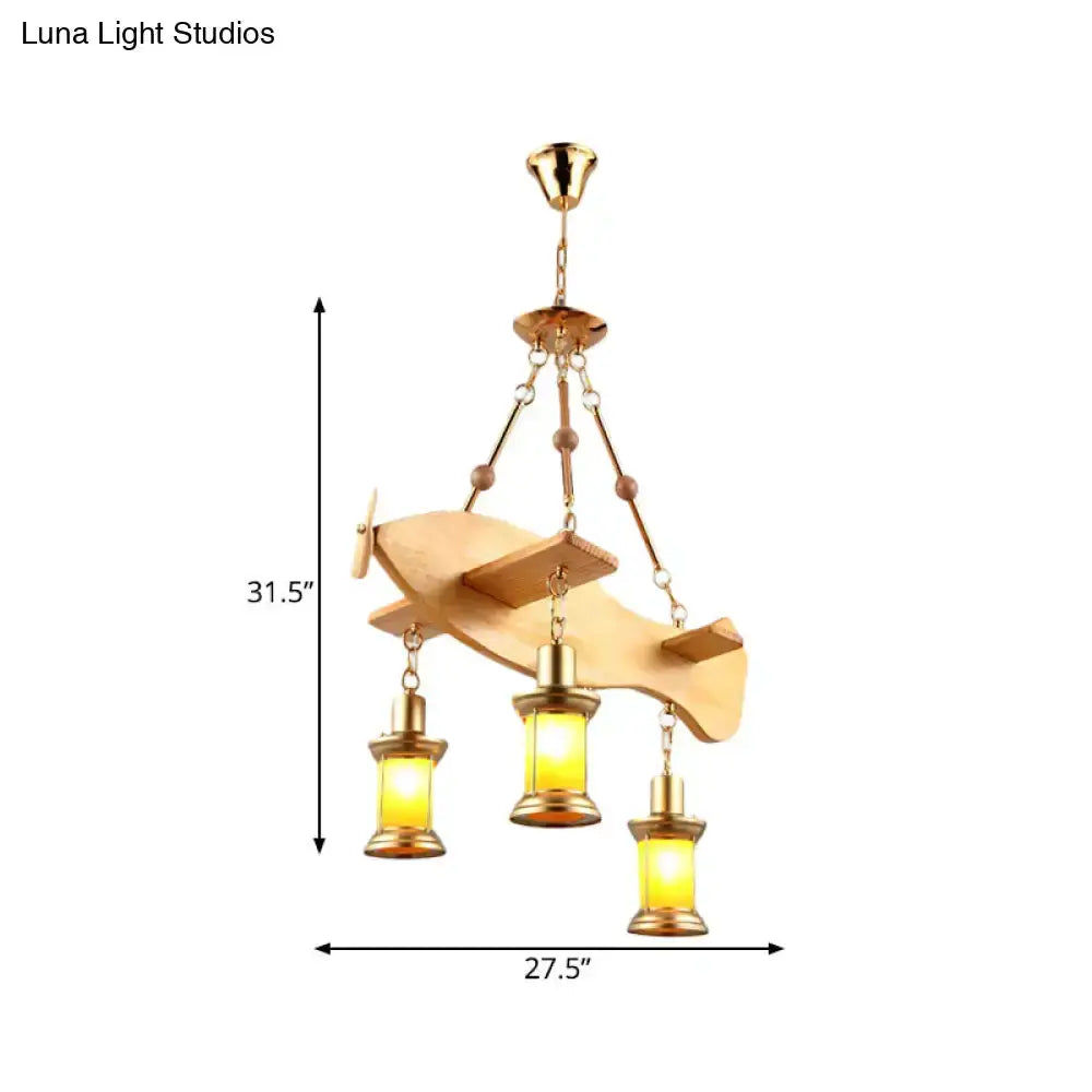 Decorbites vintage gold woven pendant light with a wooden canopy and three amber glass lanterns on Tampa Home & Garden Store