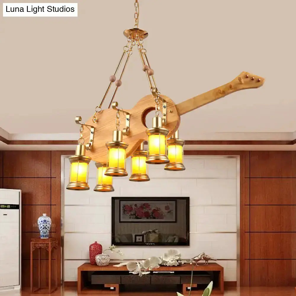 Vintage gold woven pendant light with guitar mount and five orange glass lanterns Decorbites on Tampa Home & Garden Store
