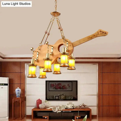 Vintage gold woven pendant light with guitar mount and five orange glass lanterns Decorbites on Tampa Home & Garden Store