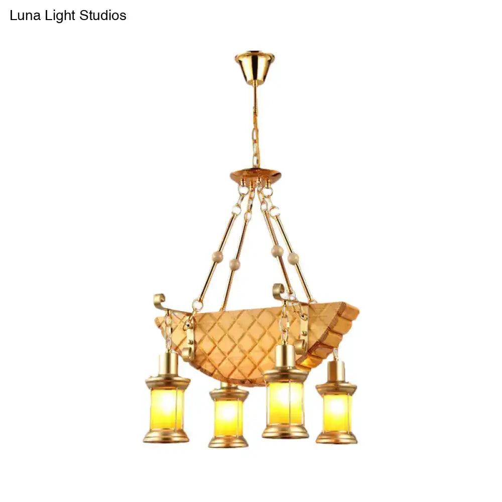 Decorbites vintage gold woven pendant light kitchen fixture with four amber glass lanterns on Tampa Home & Garden Store
