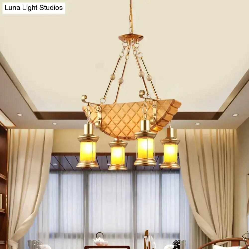 Vintage gold woven pendant light by Decorbites with orange glass lanterns for kitchen on Tampa Home & Garden Store
