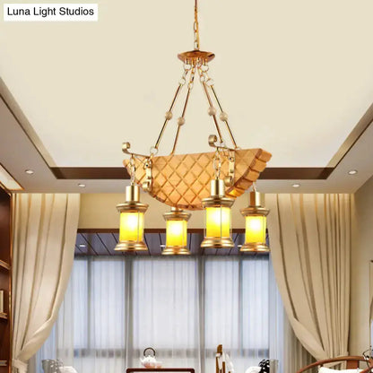 Vintage gold woven pendant light by Decorbites with orange glass lanterns for kitchen on Tampa Home & Garden Store