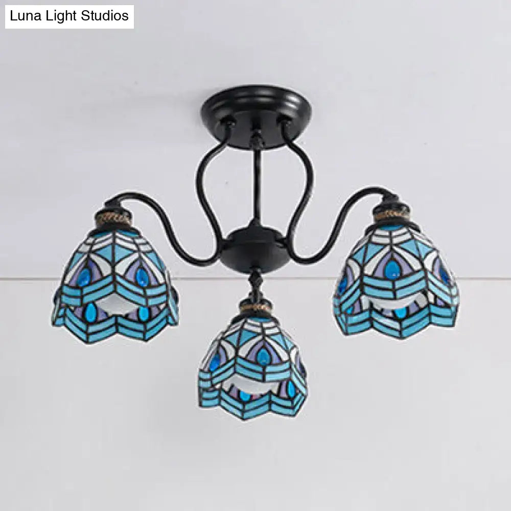 Peacock stained glass ceiling light with 3 blue teal lampshades and black metal frame on Tampa Home & Garden Store
