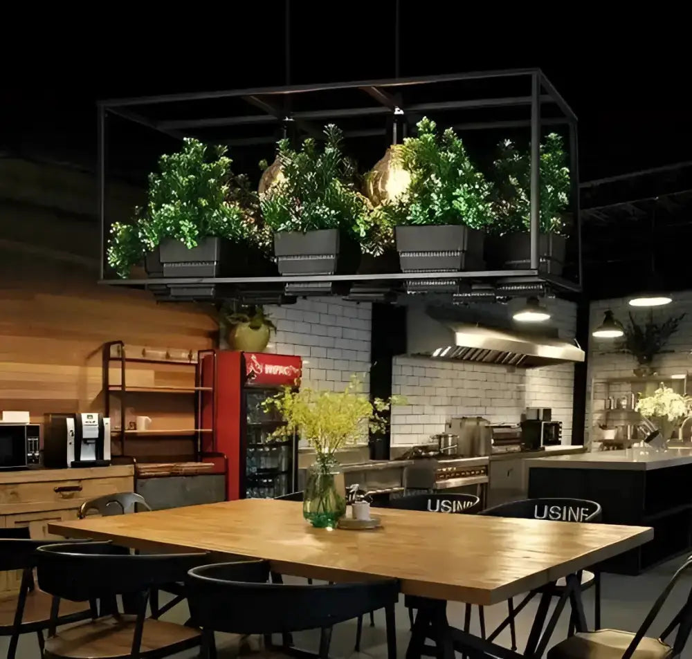 Industrial black metal planter light chandelier with four plant pots over dining table on Tampa Home & Garden Store
