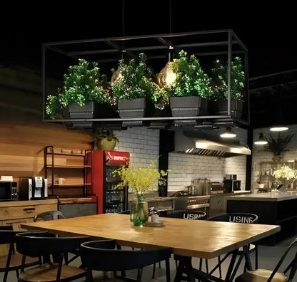 Industrial black metal planter light chandelier with four plant pots over dining table on Tampa Home & Garden Store