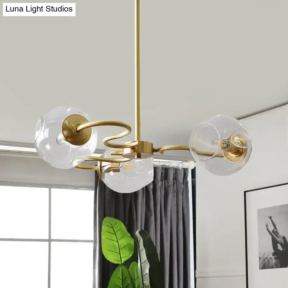 Brass Glass Globe Flush Mount ceiling light with clear glass globes and curved arms on Tampa Home & Garden Store