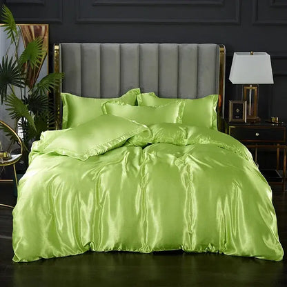Duvet cover in lime green satin with matching pillow shams on a gray upholstered bed Decorbites on Tampa Home & Garden Store