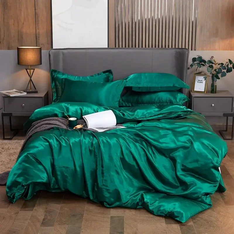 Red satin bedding set Decorbites duvet covers on bed with gray headboard on Tampa Home & Garden Store