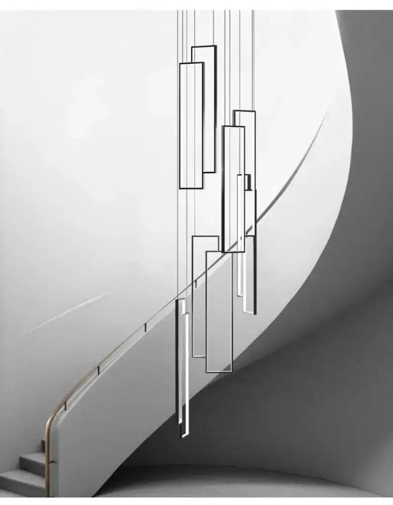 Decorbites modern black and gold rectangle LED chandelier hanging in living room on Tampa Home & Garden Store