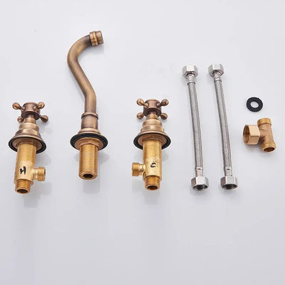 Antique Brass Wall Faucet by Decorbites with spout, cross handles and braided supply lines on Tampa Home & Garden Store