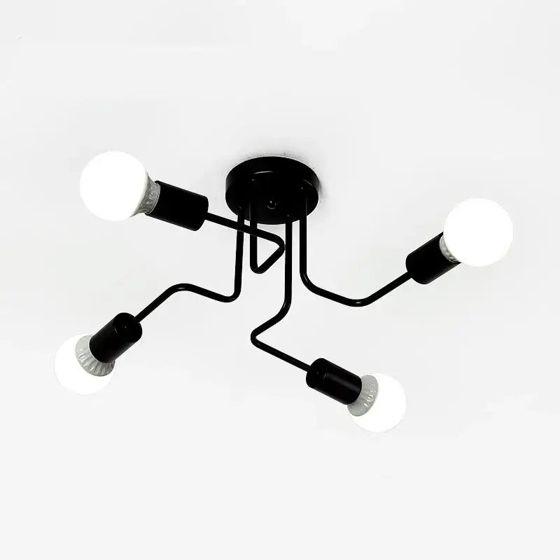 Wrought iron ceiling fixture flush mount with four black arms and exposed bulbs Decorbites on Tampa Home & Garden Store