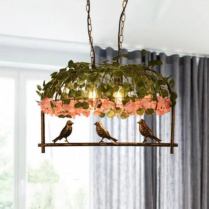 Brass birdcage ceiling light with greenery and pink flowers, three birds Decorbites flush mount on Tampa Home & Garden Store