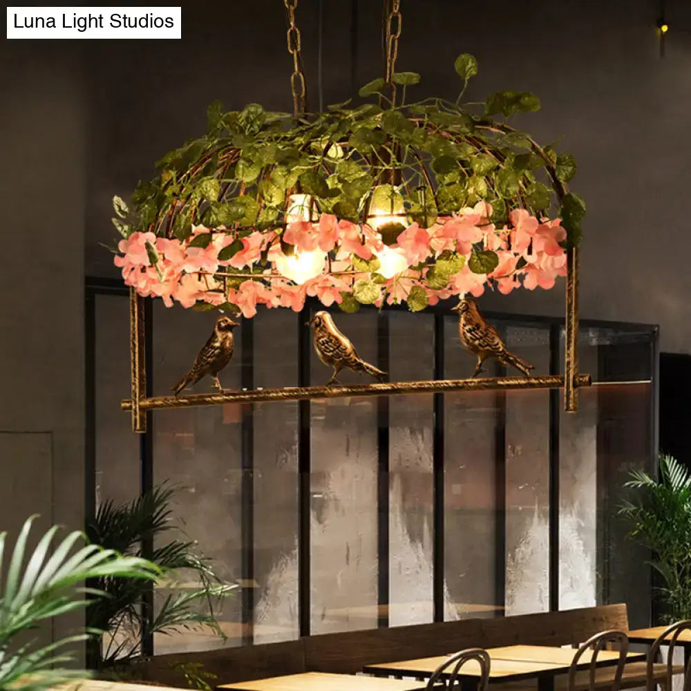 Brass Birdcage Ceiling Light by Decorbites with pink flowers, green foliage, and three birds on Tampa Home & Garden Store