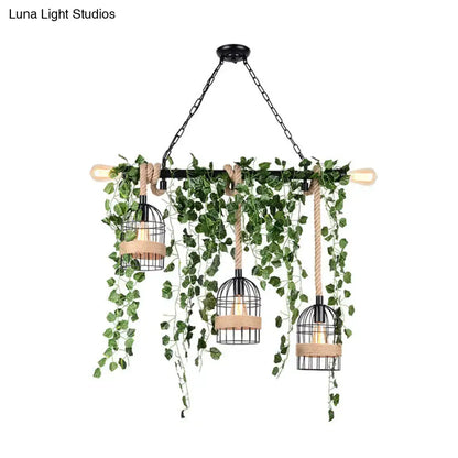 Metal Ivy Island Light pendant by Decorbites: three black cage pendants with rope wraps and ivy on Tampa Home & Garden Store