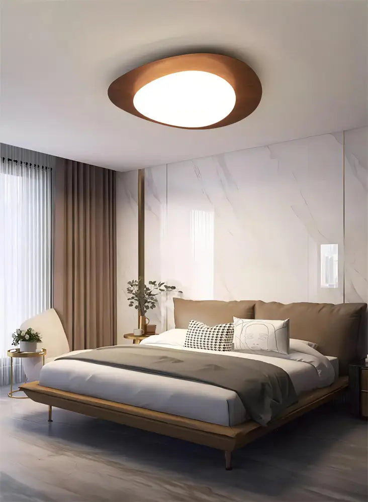Walnut oval acrylic flush mount ceiling light by Decorbites for a modern bedroom on Tampa Home & Garden Store