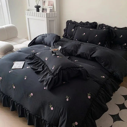 Duvet cover set by Decorbites, black with pink floral embroidery and ruffled on Tampa Home & Garden Store