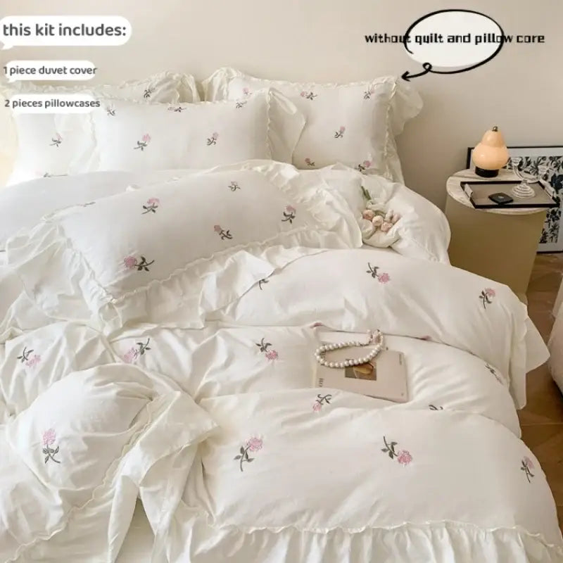 White ruffled duvet set by Decorbites with pink embroidery, includes 1 duvet cover and 2 pillowcases on Tampa Home & Garden Store