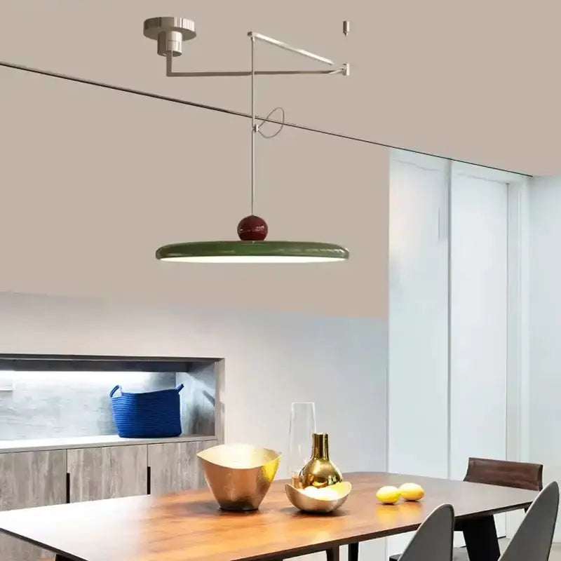 Modern red LED pendant light with a green circular shade for kitchen adjustable arm on Tampa Home & Garden Store